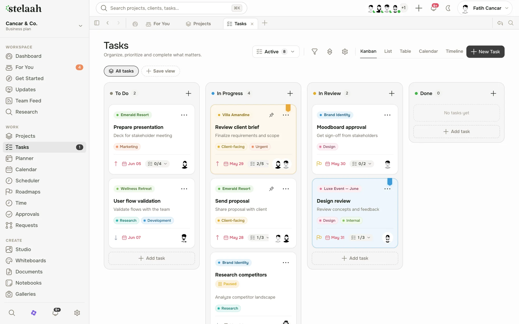 a task board grouped by status with an owner on each card